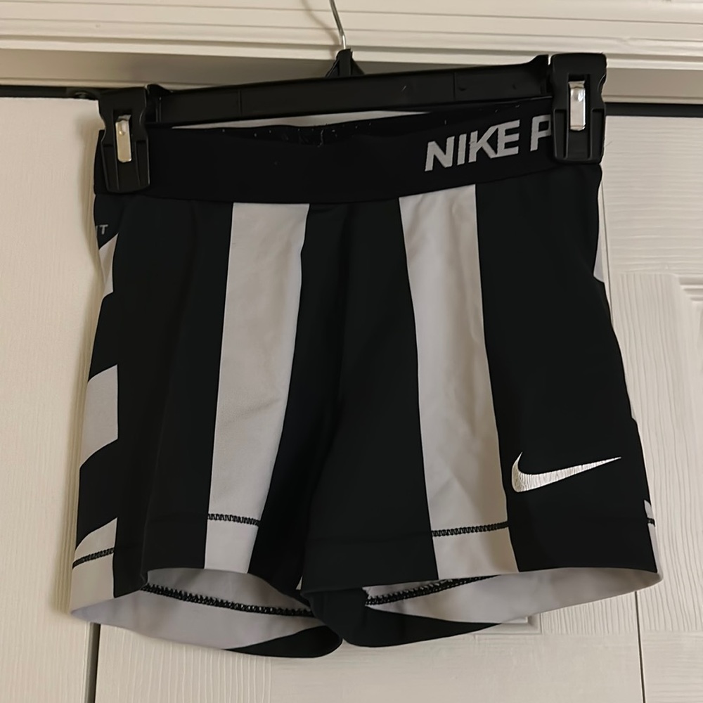 Black and white Nike pros